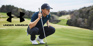 Pro golfer Jordan Spieth lining up a putt in Under Armour golf attire
